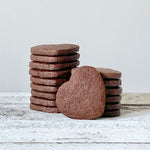 A stack of Mini Chocolate Heart Sugar Cookies