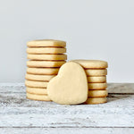 A stack of Mini Classic Heart Sugar Cookies