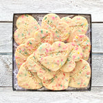 A box of one dozen Funfetti Heart Sugar Cookies