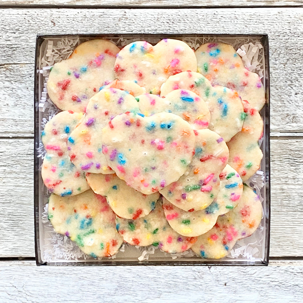 A box of 16 Mini Funfetti Heart Sugar Cookies